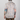 Person wearing a patterned shirt with a neutral background